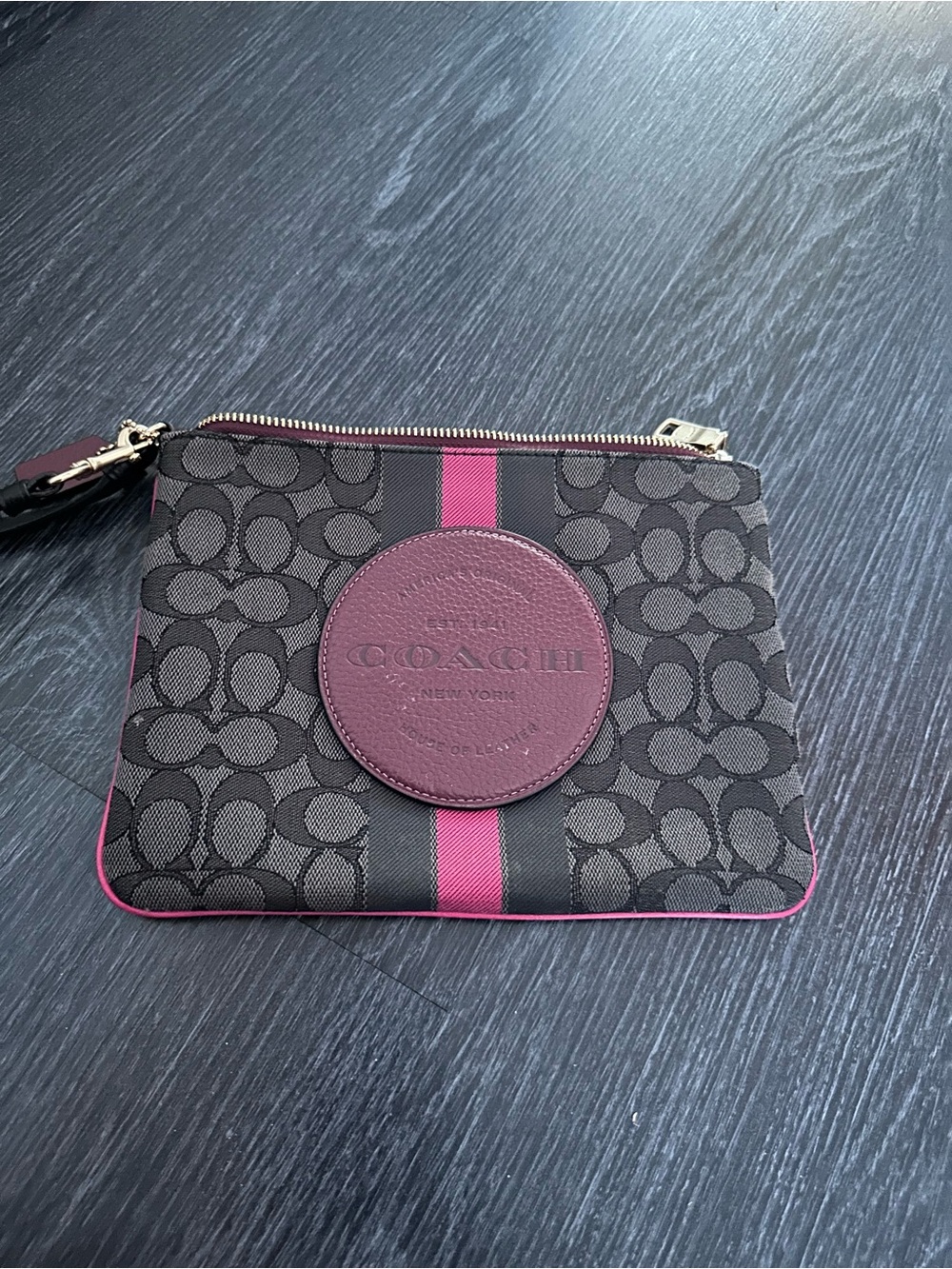 COACH Signature Zip Wristlet in Black and Berry Pink